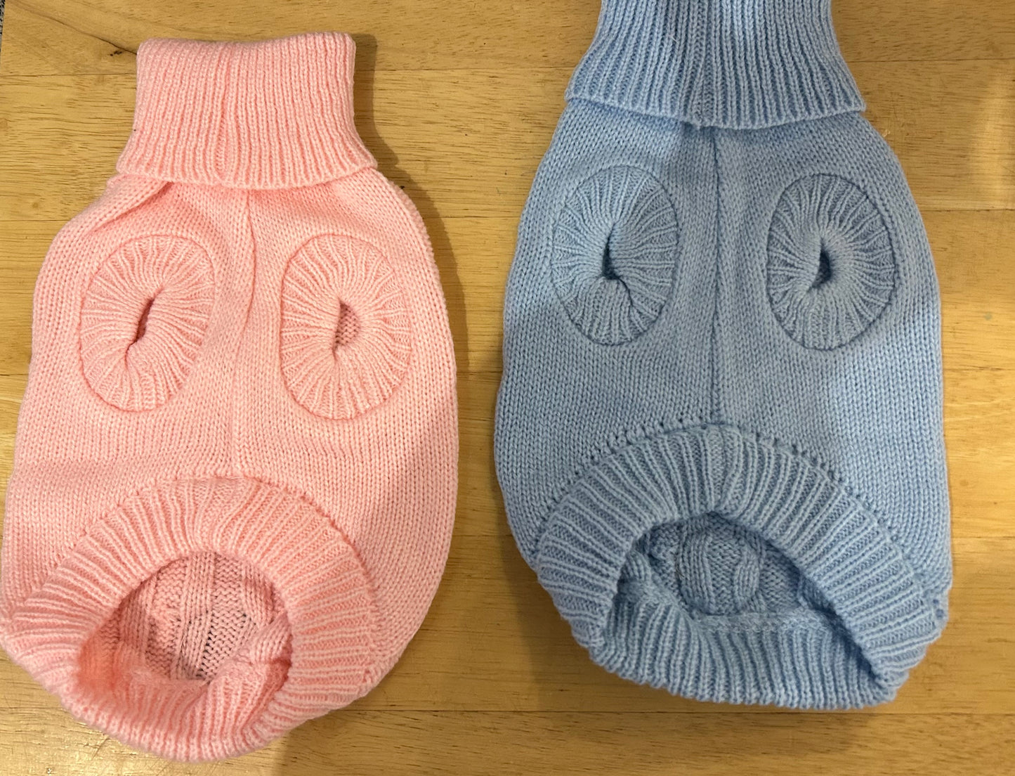 Knitted jumpers in a variety of colours